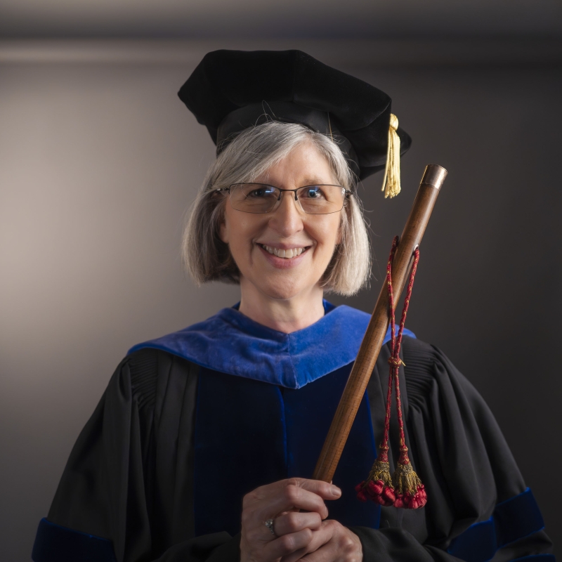 A photo of Kathleen LoGiudice in her academic regalia