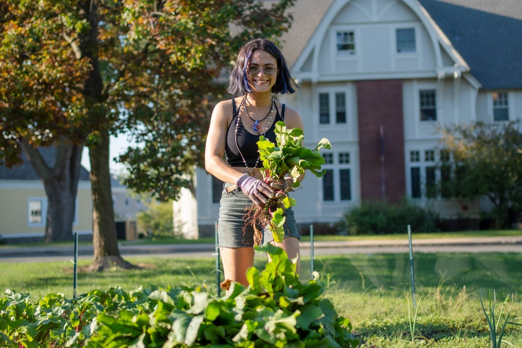 A student gardening in the Octopus's Garden