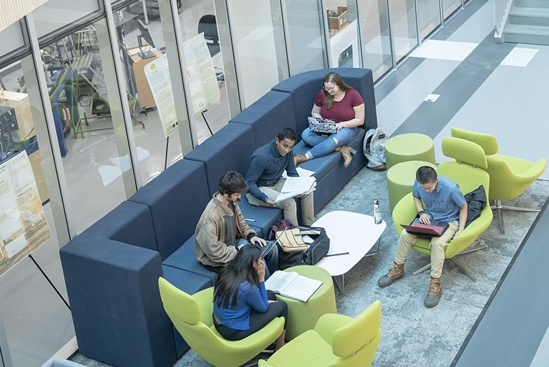 Students on a couch in ISEC studying