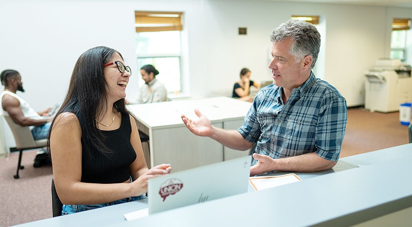 A career center advisor talking with one of the students