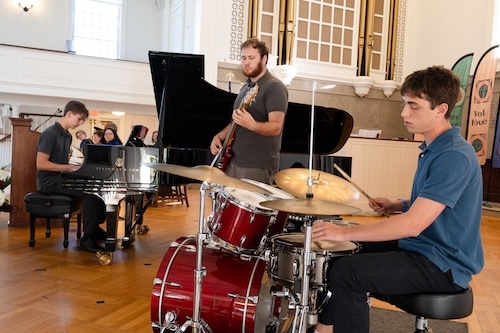 Ryder Mollo ‘26, Ben Pistiner ‘27 and Leo Weisberger ‘26 were presented with the Hollander Convocation Music Prize by Jennifer Matsue, professor of music and chair of the department.