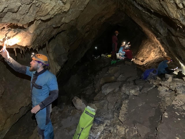 Union students in a cave in Peru