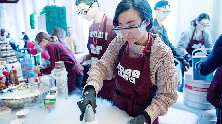 Chemistry Club students making ice cream