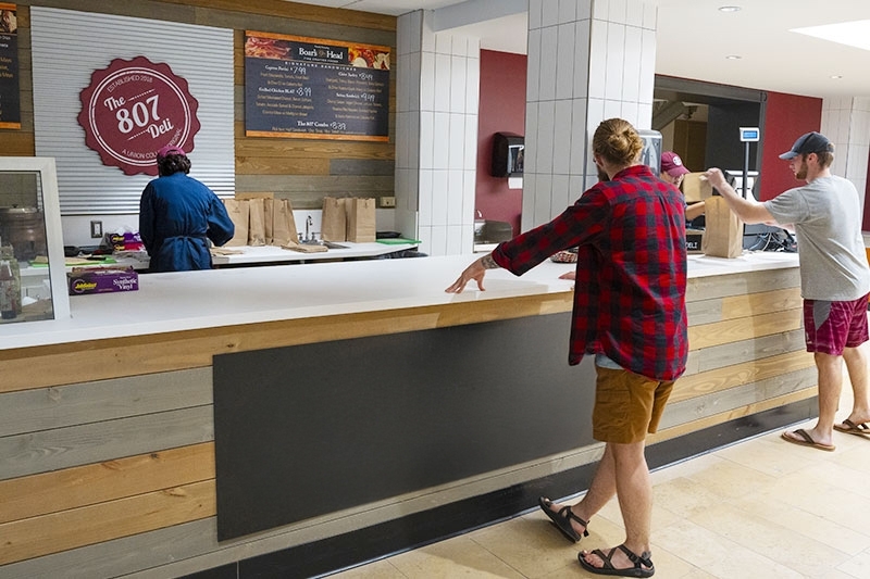 A student placing an order at the 807 Deli