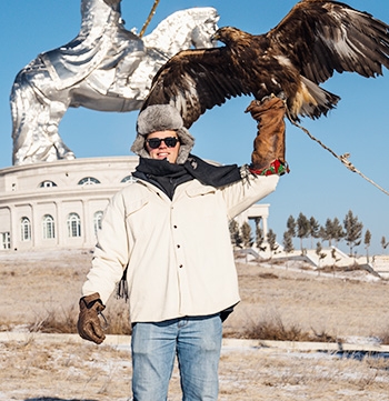  Luke MacDonald  with a falcon perched on his arm