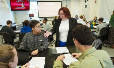 Associate Professor of English Jennifer Mitchell '04 in a classroom with students