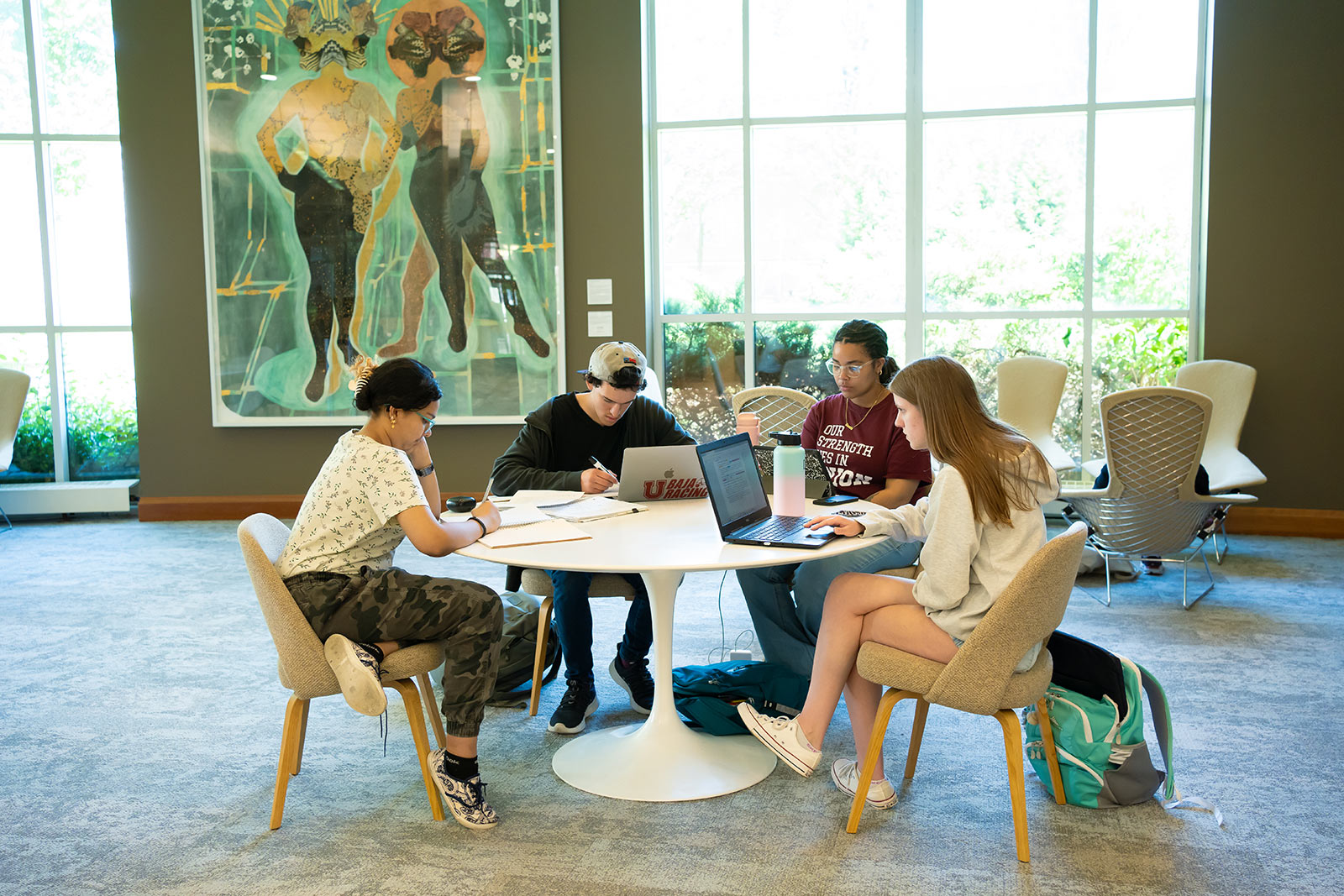 Student group study session in the library common area.